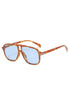 Orange tort aviator sunglasses with UV protection and stylish orange lenses.