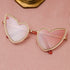 BELOVED Sunglasses with heart wings frame, lightweight polycarbonate and copper design, UV protection – bold festival and party statement shades.
