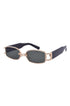 Sunglasses with rose gold frame and dark lenses on a white background